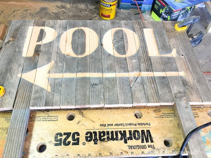 Create the perfect outdoor decor for summer with this DIY wood sign with a router. Using reclaimed wood, the 3D pool sign is perfect for your next party! Housefulofhandmade.com | Router Sign | Reclaimed Wood Sign | How to Make a Sign with a Router | Scrap Wood Projects | Summer Sign | Outdoor Sign