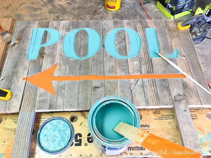 Create the perfect outdoor decor for summer with this DIY wood sign with a router. Using reclaimed wood, the 3D pool sign is perfect for your next party! Housefulofhandmade.com | Router Sign | Reclaimed Wood Sign | How to Make a Sign with a Router | Scrap Wood Projects | Summer Sign | Outdoor Sign