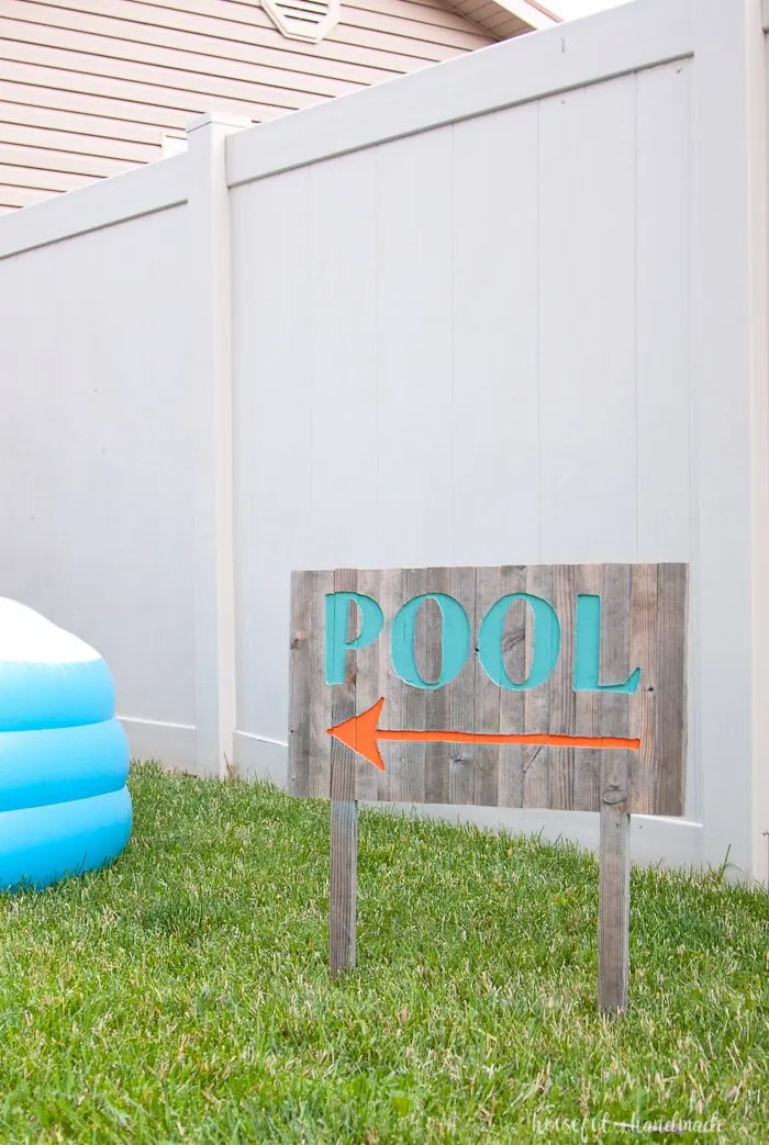 Create the perfect outdoor decor for summer with this DIY wood sign with a router. Using reclaimed wood, the 3D pool sign is perfect for your next party! Housefulofhandmade.com | Router Sign | Reclaimed Wood Sign | How to Make a Sign with a Router | Scrap Wood Projects | Summer Sign | Outdoor Sign