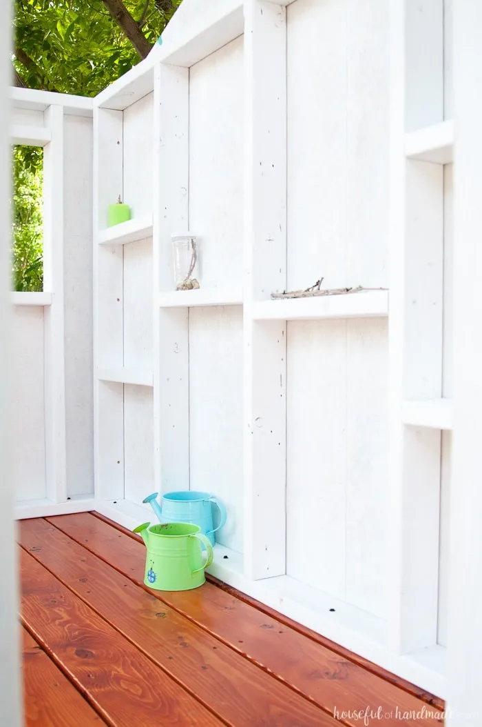 Create the perfect outdoor space for your kids this summer. Build a DIY playhouse for hours of imaginative play. This week we share the plans for the walls, including time and cost breakdown. Follow along at Housefulofhandmade.com | How to Build a Playhouse | DIY Swing Set | Small Playhouse | Playhouse Build Plans