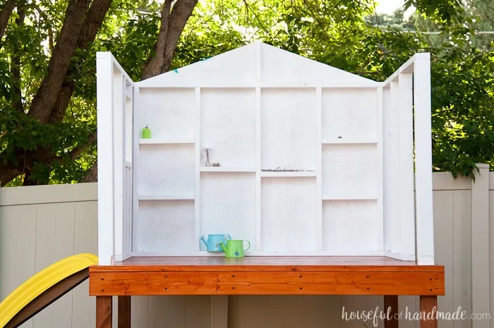 Create the perfect outdoor space for your kids this summer. Build a DIY playhouse for hours of imaginative play. This week we share the plans for the walls, including time and cost breakdown. Follow along at Housefulofhandmade.com | How to Build a Playhouse | DIY Swing Set | Small Playhouse | Playhouse Build Plans 