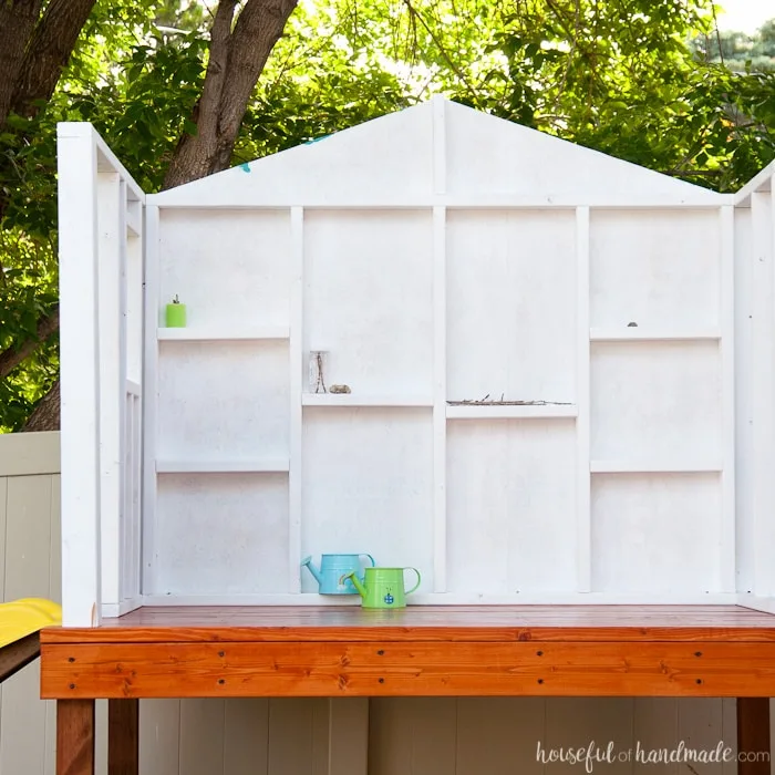 Create the perfect outdoor space for your kids this summer. Build a DIY playhouse for hours of imaginative play. This week we share the plans for the walls, including time and cost breakdown. Follow along at Housefulofhandmade.com | How to Build a Playhouse | DIY Swing Set | Small Playhouse | Playhouse Build Plans