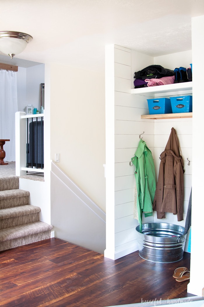 Take a peak into the houses of your favorite bloggers this summer. Each week we will be sharing different rooms in our home. This week is all about the entryway. See how we have our Farmhouse Entryway mudroom decorated and ready for summer. Housefulofhandmade.com | Summer Home Tour | Small Entry Decor | Small Mudroom Ideas | Entryway Mudroom Ideas | Mudroom Storage | DIY Shiplap Entry | Room by Room Summer Series