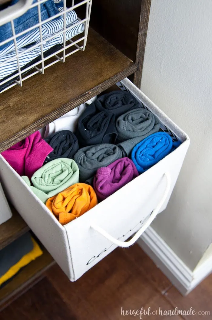 Use these amazing DIYs to Organize your home this year. Learn how to easily store small clothing items. See the entire budget walk in closet reveal at Housefulofhandmade.com