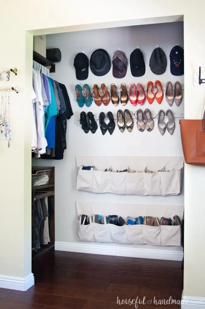 Drop cloth shoe storage on the wall with cheap high heel storage above it.