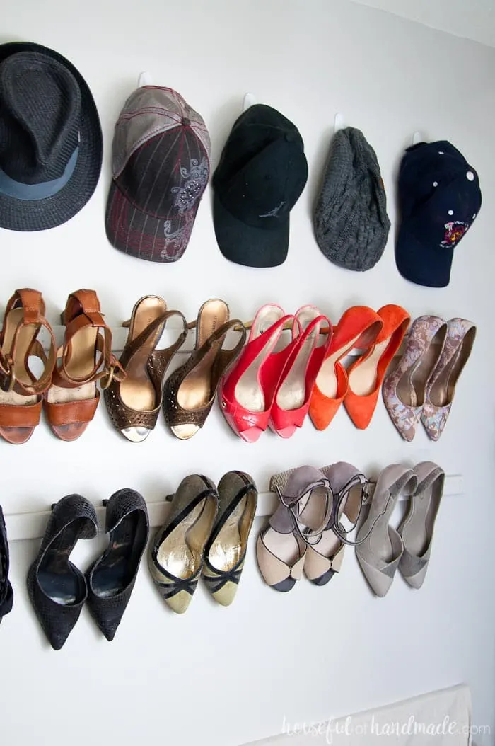 See how we solved our closet storage problems on a budget. Our walk in closet now has storage for hats, shoes, bags and more! Housefulofhandmade.com