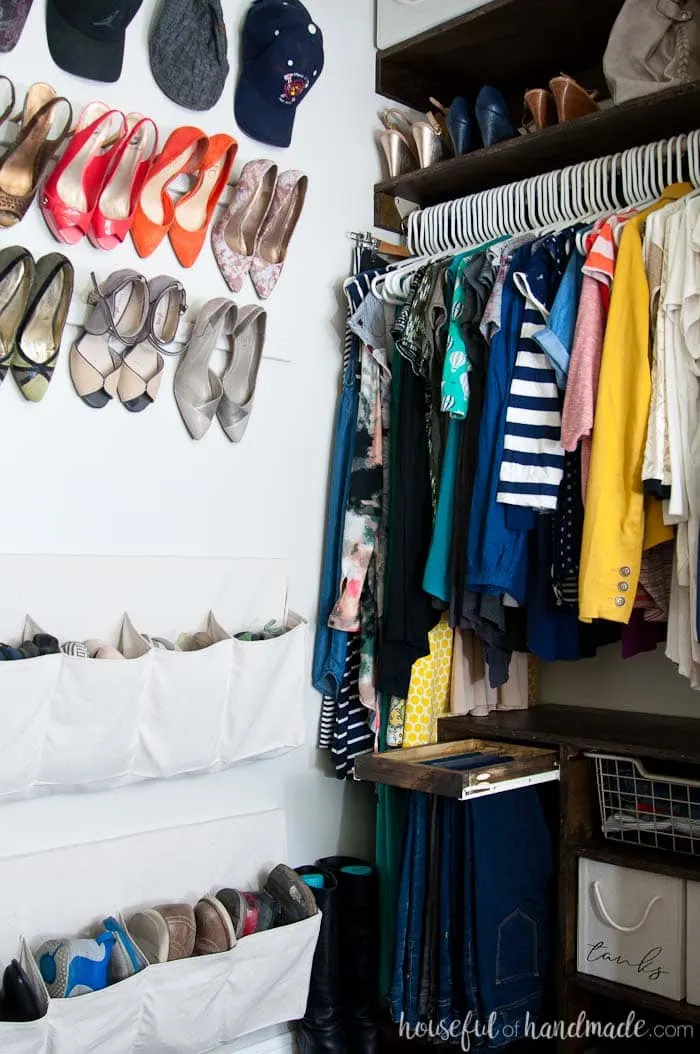 The perfectly organized and beautiful walk in closet only cost $100. Includes lots of clothing and shoe storage solutions. Housefulofhandmade.com