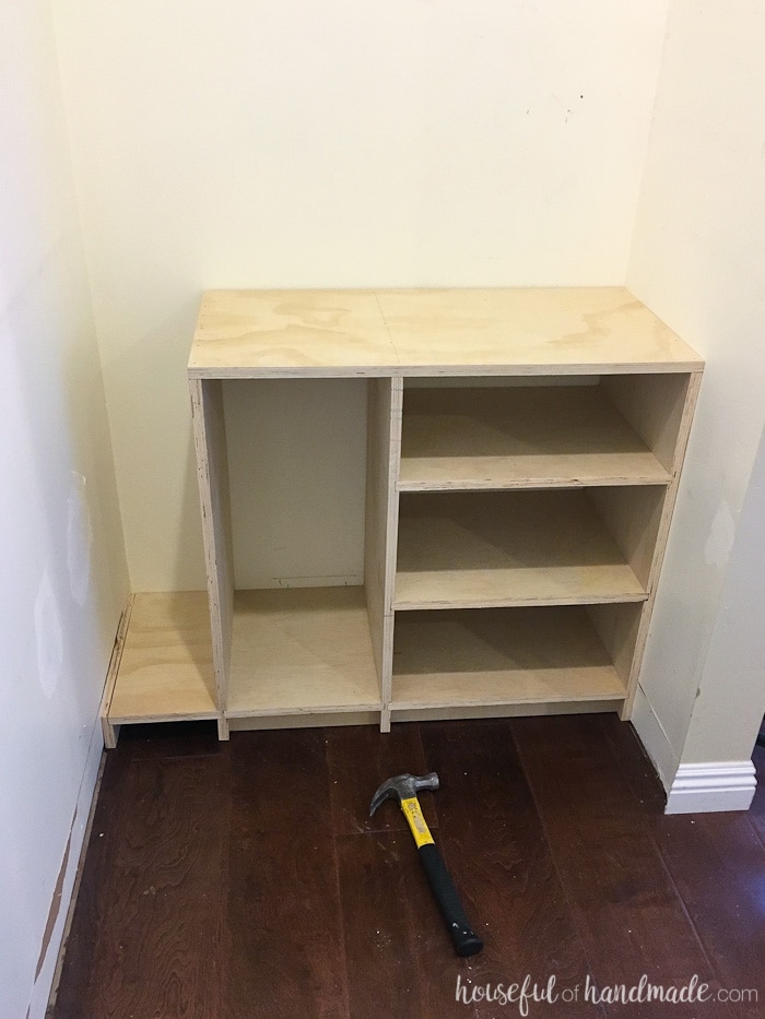 Assembled cabinet and toe kick dry fit into the other side of the walk in closet. 