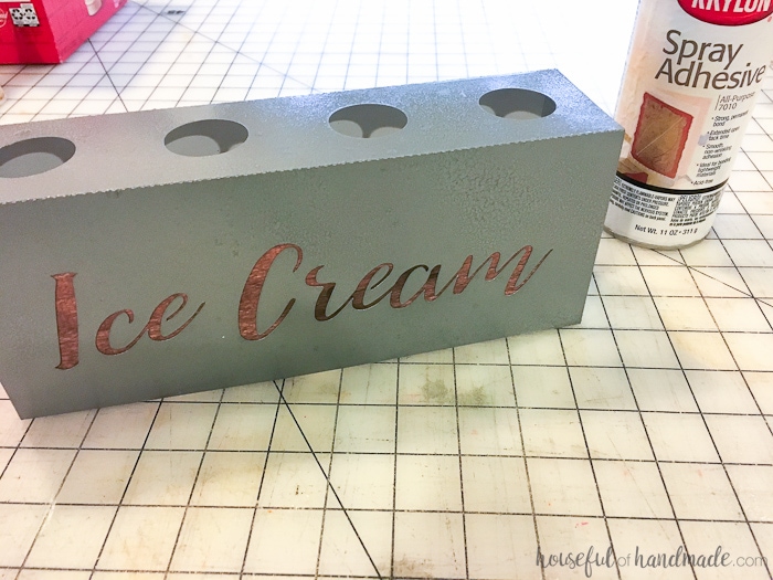 wood looking paper attached to the inside of a DIY farmhouse ice cream cone holder