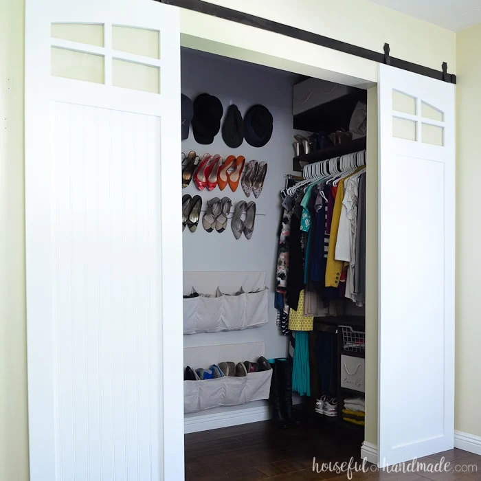 These inexpensive DIY sliding barn doors are perfect for adding style to your bedroom. Update your old closet doors with these instead! Housefulofhandmade.com