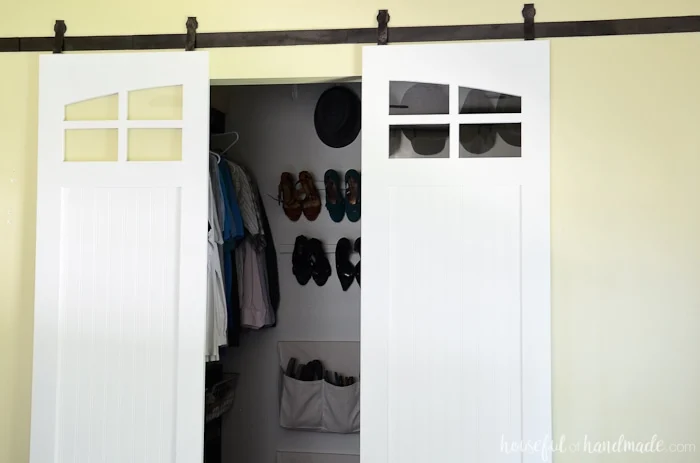 Add farmhouse style to your home with these sliding closet barn doors. Get the free build plans from Housefulofhandmade.com