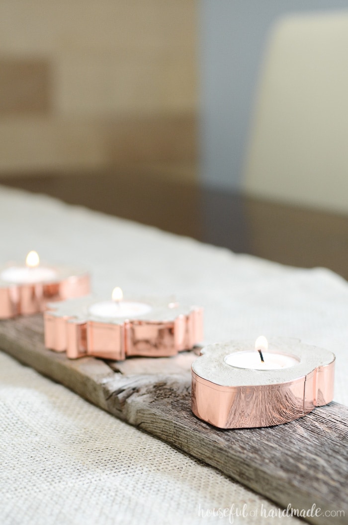 Copper cookie cutters take on a new life. Turn them into home decor with these easy copper candle holders for fall. Housefulofhandmade.com