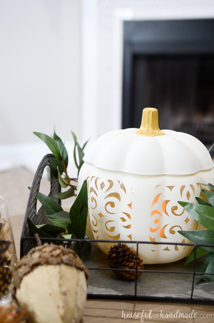 Turn a boring glass pumpkin into a beautiful filigree punched ceramic pumpkin for a high end look! Housefulofhandmade.com