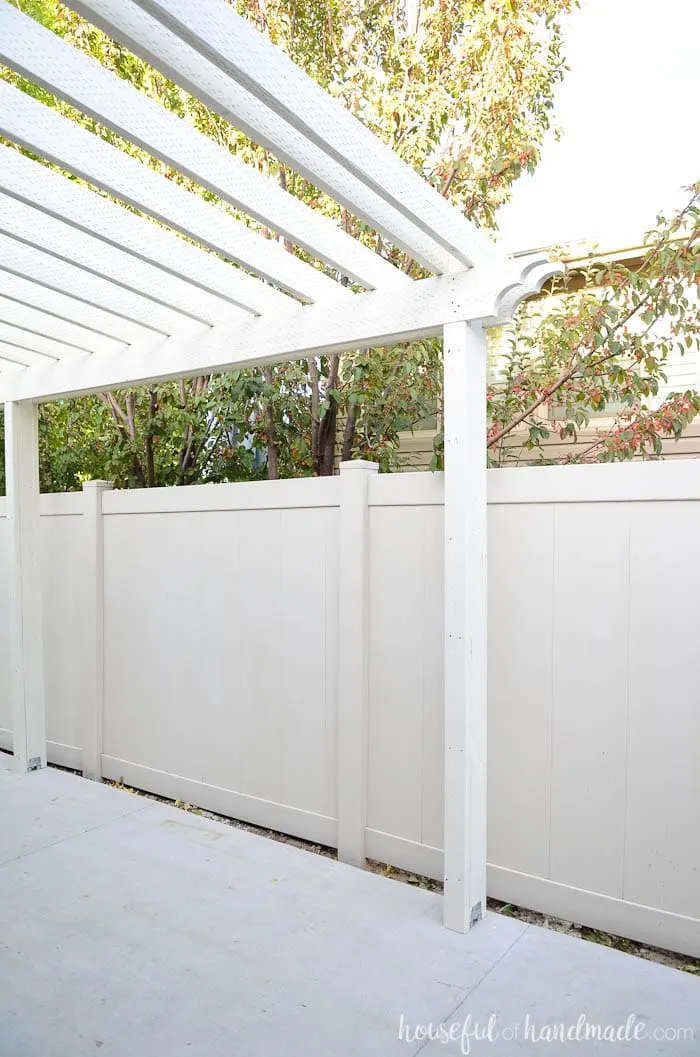See how we turned our boring side yard into usable living space. This patio pergola is the perfect weekend project. Housefulofhandmade.com