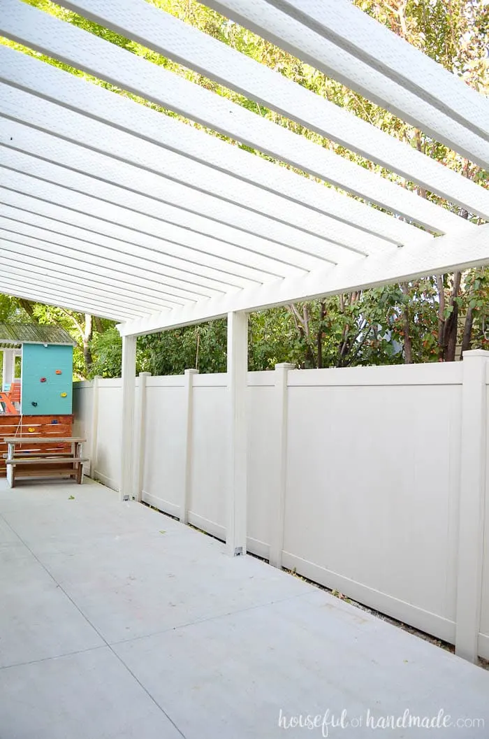 A patio pergola is the perfect way to define an outdoor space. See how we built a DIY pergola. Housefulofhandmade.com