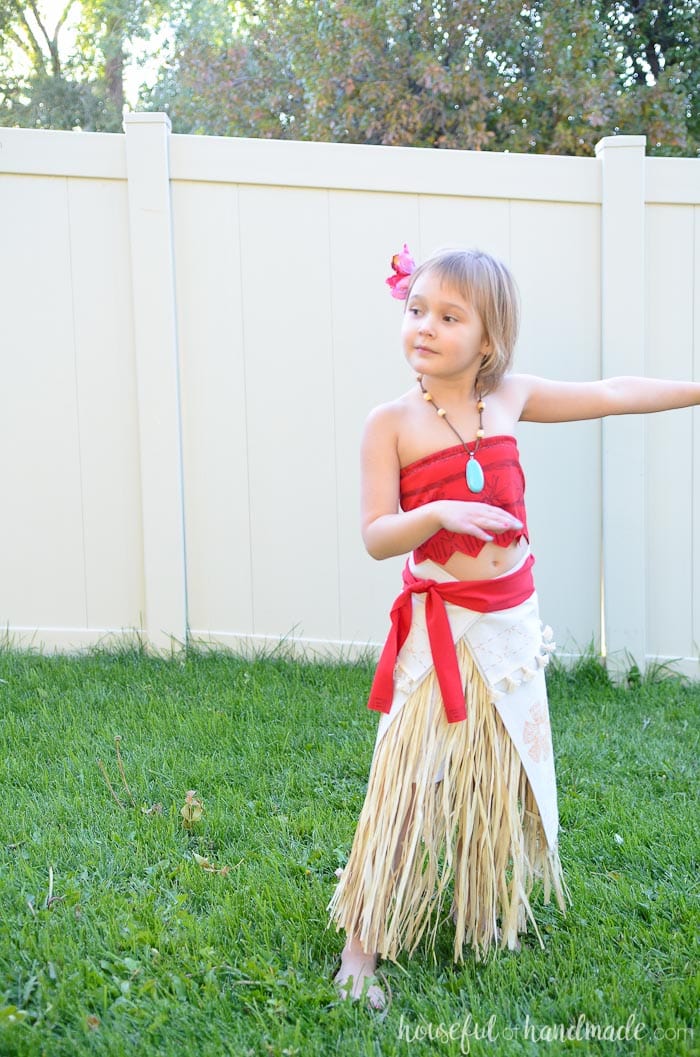 Little girl dancing in DIY Moana costume for Halloween 