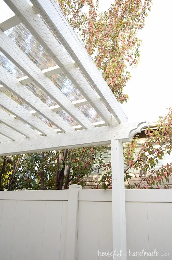 Installing a clear pergola roof was the best decision ever. It has turned our side yard is a three season patio that we can enjoy in any weather.