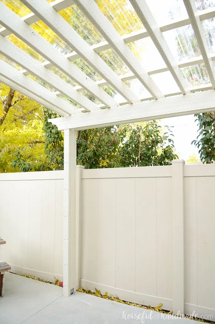 This pergola is gorgeous! See the complete plans for the DIY pergola and clear pergola roof at Housefulofhandmade.com