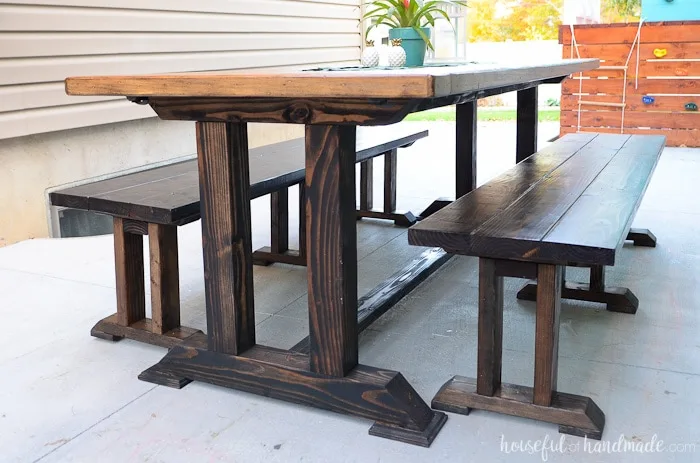 Outdoor dining table with benches