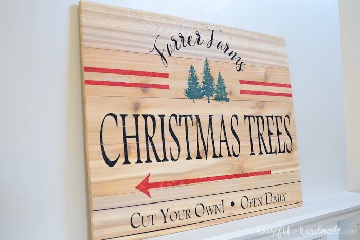 Turn inexpensive fence pickets into a beautiful farmhouse Christmas sign. This vintage Christmas tree farm sign is perfect for a festive mantel. Housefulofhandmade.com