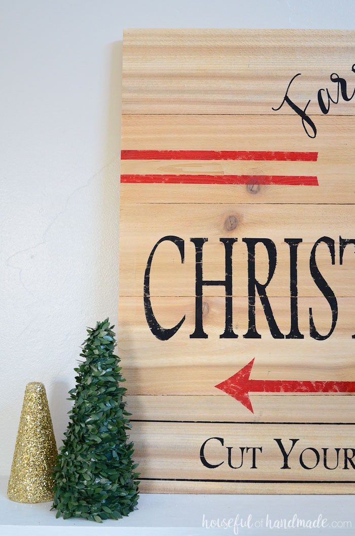 This vintage inspired Christmas tree farm sign is an easy and inexpensive way to add Farmhouse Christmas charm to your home. Build the perfect farmhouse Christmas decor with budget fence pickets. Housefulofhandmade.com