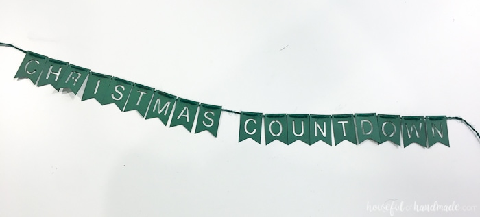 Create a simple farmhouse banner to top this beautiful rustic advent calendar. Housefulofhandmade.com