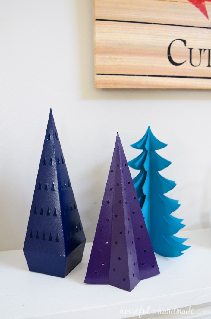 These paper Christmas trees are the perfect way to add Christmas decor on a budget. They are perfect on our holiday mantel. Housefulofhandmade.com
