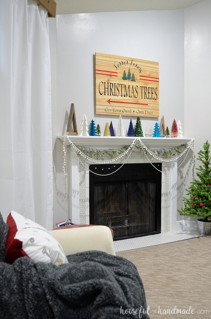 See how we decorated our holiday mantel with lots of DIY projects. And get lots of Christmas mantel inspiration with all the beautiful mantels in this series. Housefulofhandmade.com