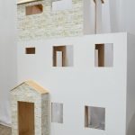 A handmade dollhouse is the perfect gift for creative play. This plywood dollhouse is sized large enough to fit 11