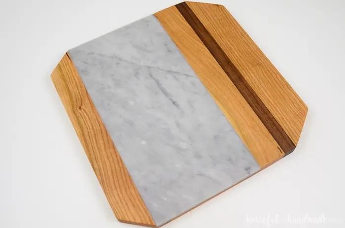 Make a marble cutting board for the perfect cheese plate. I can't wait to use it for holiday entertaining. Housefulofhandmade.com