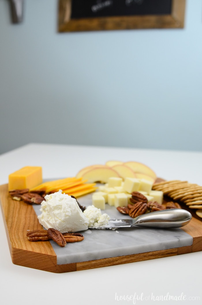 Your favorite bloggers are sharing cocktails, appetizers, party decor, table ideas, hostess gift and more to help you get ready for Christmas and New Year's Eve. Check out this fun handmade marble cheese board and then grab a cup of wine and see all the rest of the fun party ideas. Housefulofhandmade.com