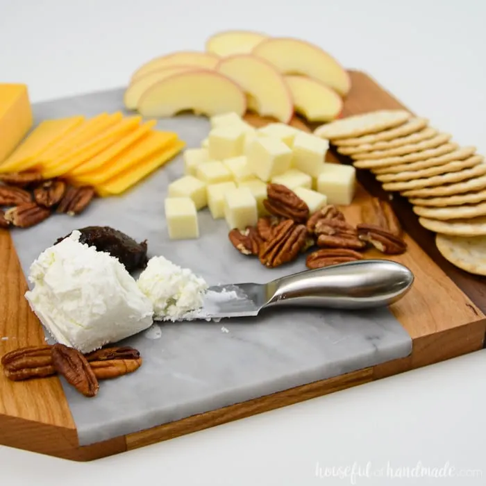Create a beautiful wood and marble cheese board with this easy tutorial. Take a simple cheese plate to any party to wow the guests. Housefulofhandmade.com