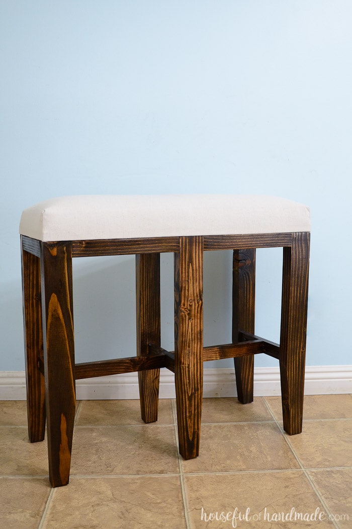 These upholstered bar height benches are perfect for creating a lot of seating fast! Easy to build. Get the free plans from Housefulofhandmade.com.