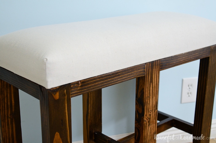 Upholster double bar stool benches with drop cloth for easy clean up. Drop cloth is super sturdy and cheap! Housefulofhandmade.com