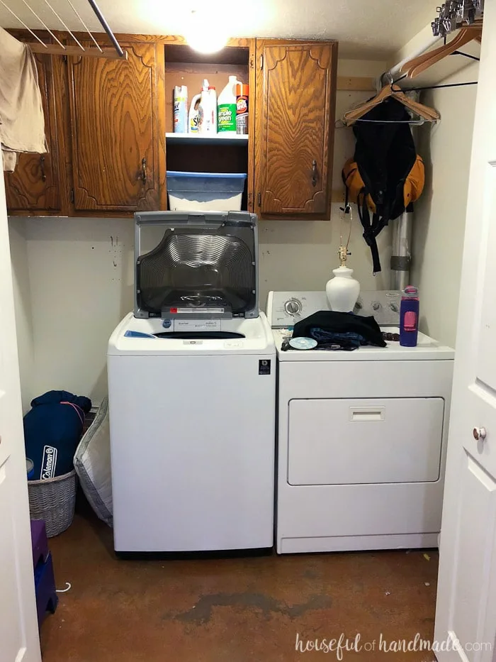 Before photo of the colorful farmhouse laundry room makeover. 