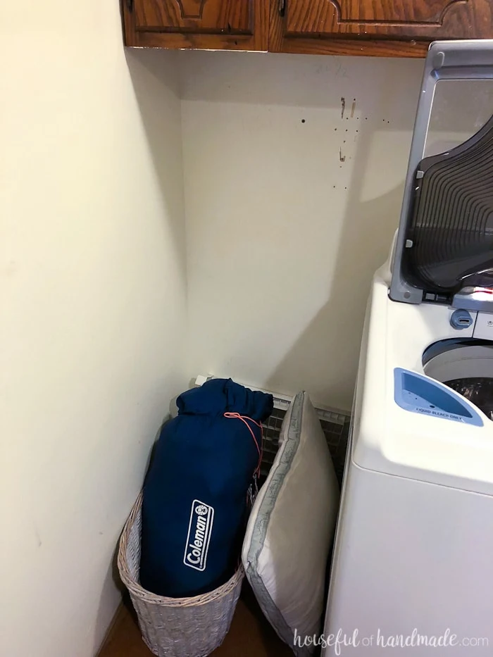 Turn wasted space into the perfect place to organize your laundry. See how we turn our laundry room with this $100 laundry room makeover. Housefulofhandmade.com