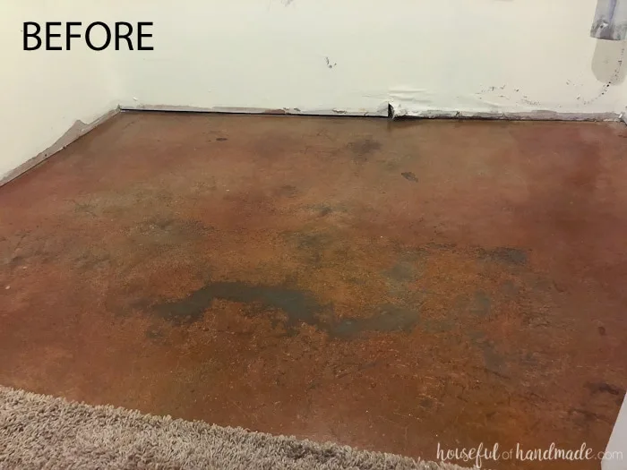 This boring concrete basement floor was turned into a beautiful patterned tile floor on a budget. See the transformation on Housefulofhandmade.com.