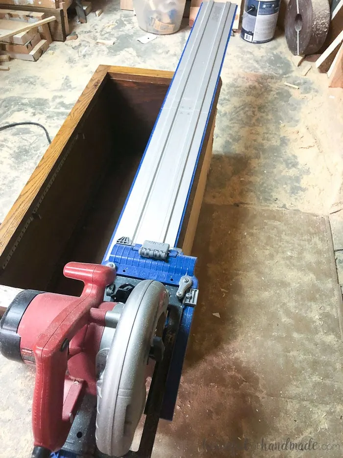 Using a circular saw and guide track, I was able to easily square up the edges of the cabinets. Now they fit in our laundry room remodel. Housefulofhandmade.com