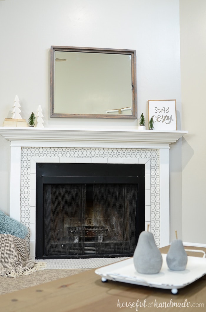 Beautiful simple farmhouse mantel from Housefulofhandmade.com.