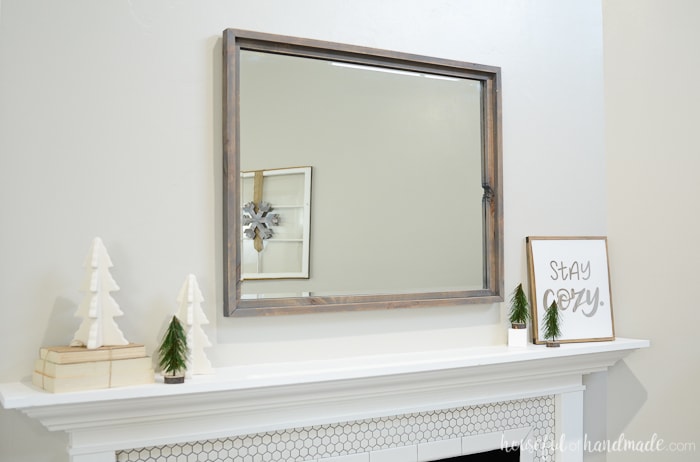 A large mirror over the mantel is such a classic. Add your favorite farmhouse decor to turn it into a simple farmhouse winter mantel. Housefulofhandmade.com