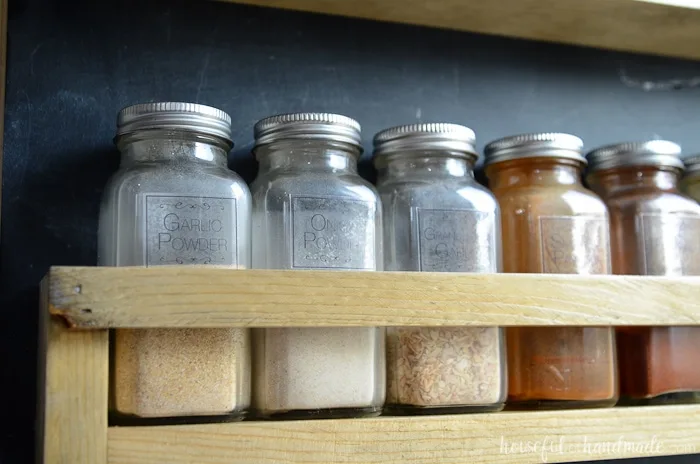 spice jars shown in diy spice rack
