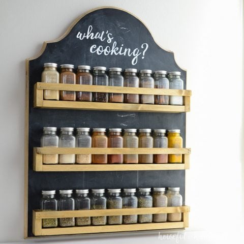 Wall spice organizer with chalkboard back and 3 rows for lots of spice storage.
