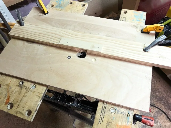 Easy homemade router table of 1/2" plywood with scrap wood guide. Housefulofhandmade.com