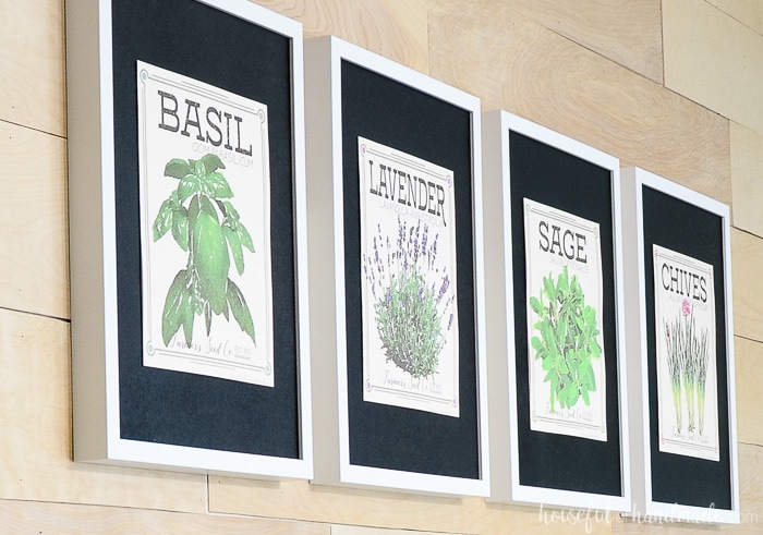 Bring the outdoors inside with these free vintage inspired herb prints made to look like vintage seed packets. Herb prints are a great way to add wall decor to your kitchen or dining room. This vintaged herb seed packet art is an easy way to add a statement or gallery wall to any home. Housefulofhandmade.com Basil, Lavendar, Sage, and Chives vintaged herb prints on black mats. Housefulofhandmade.com