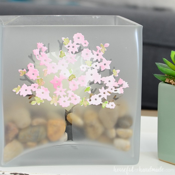 Square candle holder with frosted tree decorated with spring blossoms. Housefulofhandmade.com