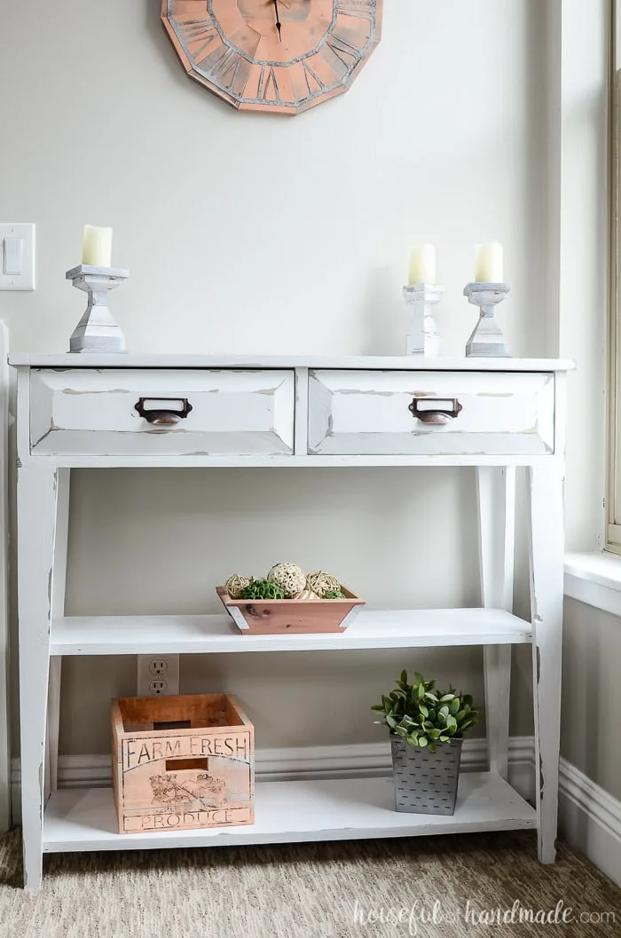 Farmhouse style small console table with 2 drawers and open shelving. Housefulofhandmade.com