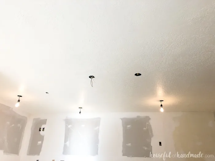 Behr Pot of Cream is the perfect ceiling paint. Just a hint of warmth makes it the perfect color for our farmhouse kitchen remodel. Housefulofhandmade.com