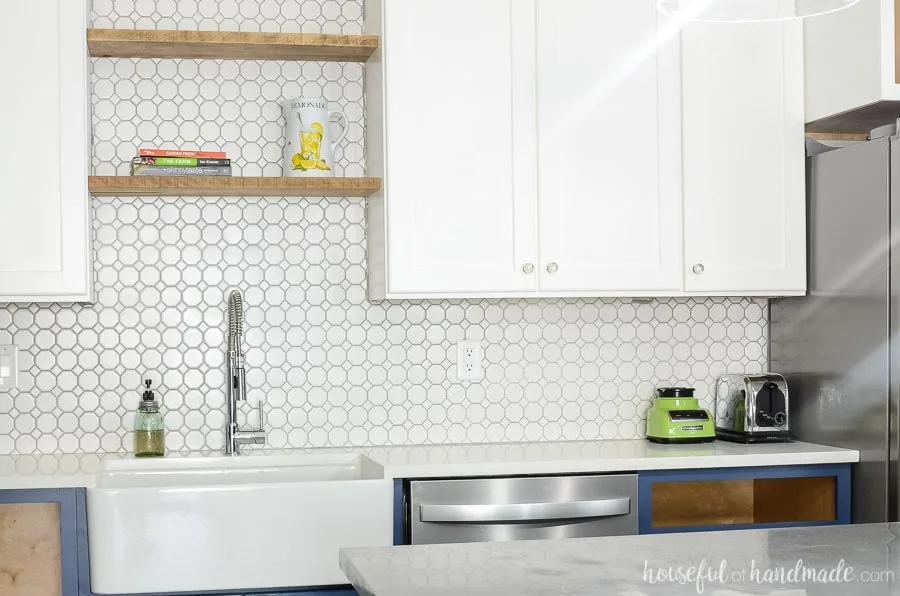 We added counter space next to our kitchen sink by removing an unorganized pantry and installing pantry cabinets instead. See the full budget farmhouse kitchen remodel at Housefulofhandamde.com.