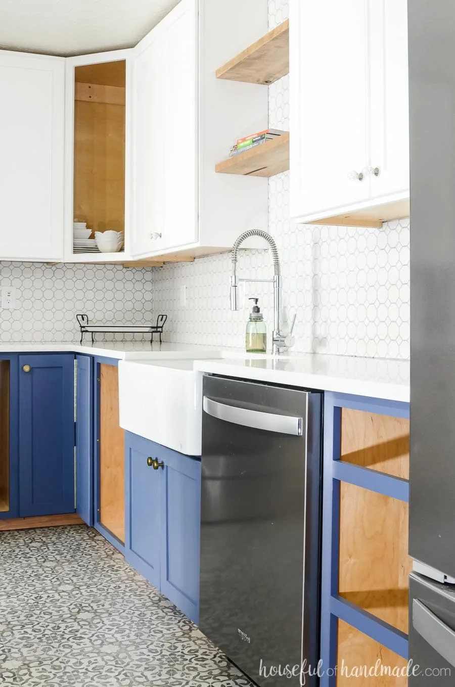 Farmhouse kitchen remodel with Durango Blue base cabinets and Polar Bear upper cabinets. White octagon tile and large farmhouse sink. Housefulofhandmade.com