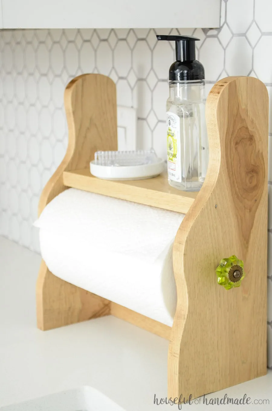 Farmhouse paper towel holder on kitchen counter with soap and brush